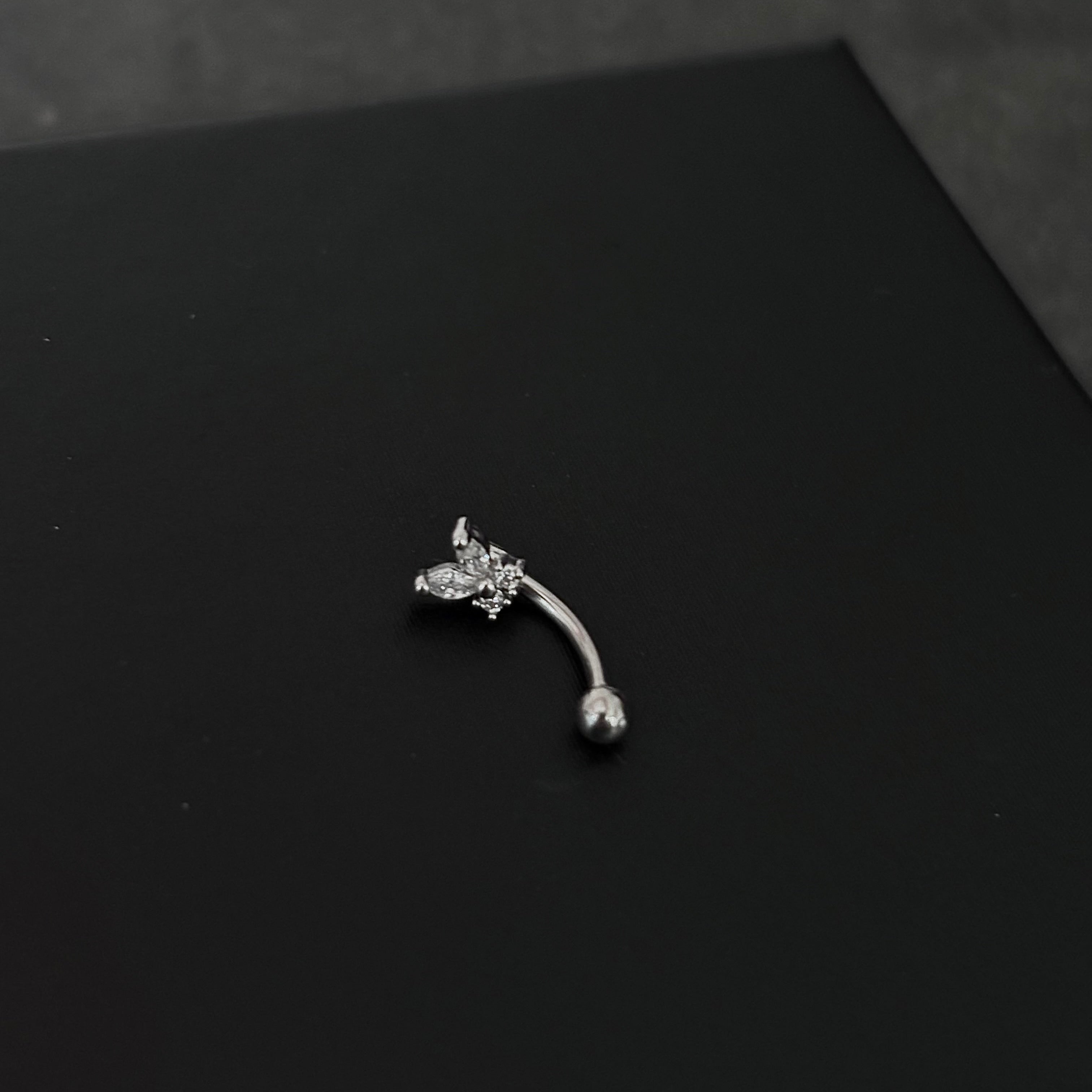 Piercing ceja / rook c009