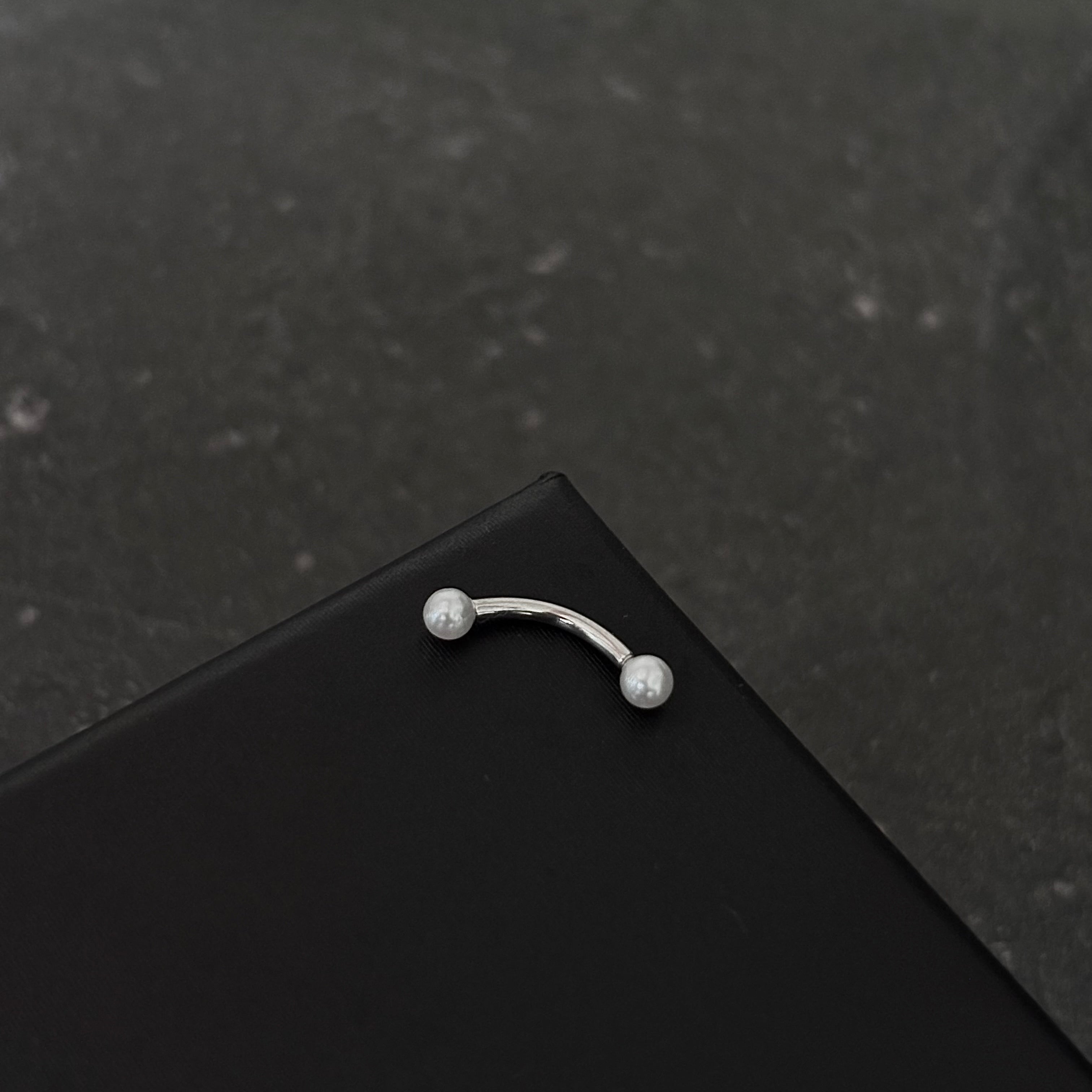 Piercing ceja / rook c026