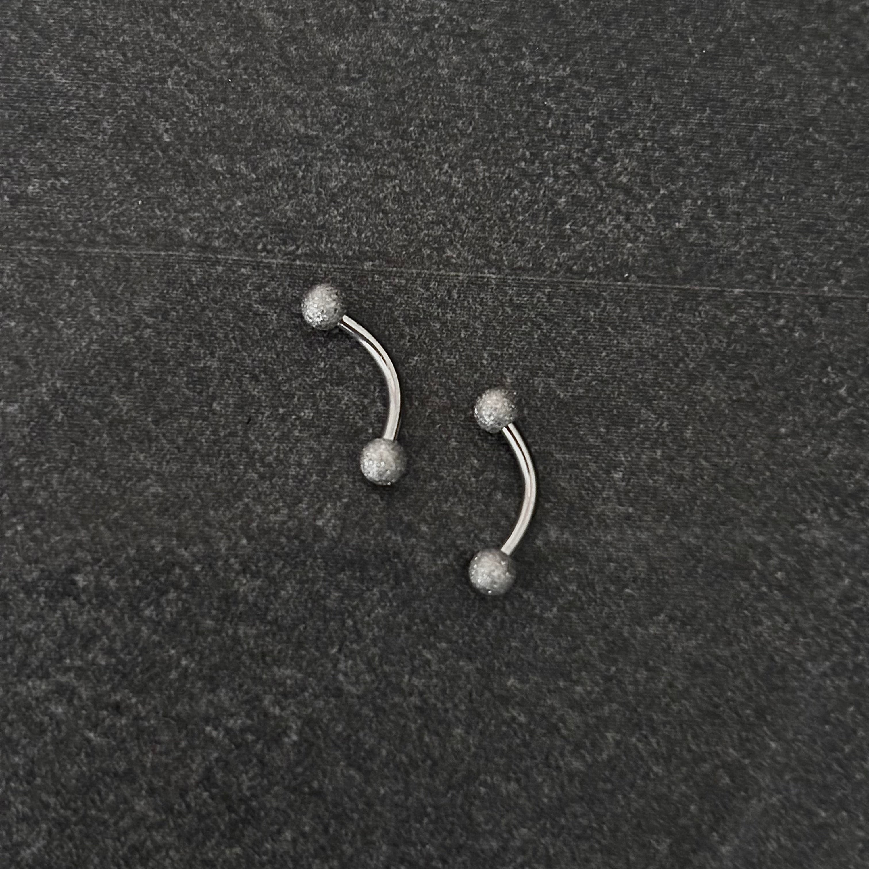 Piercing ceja / rook c001