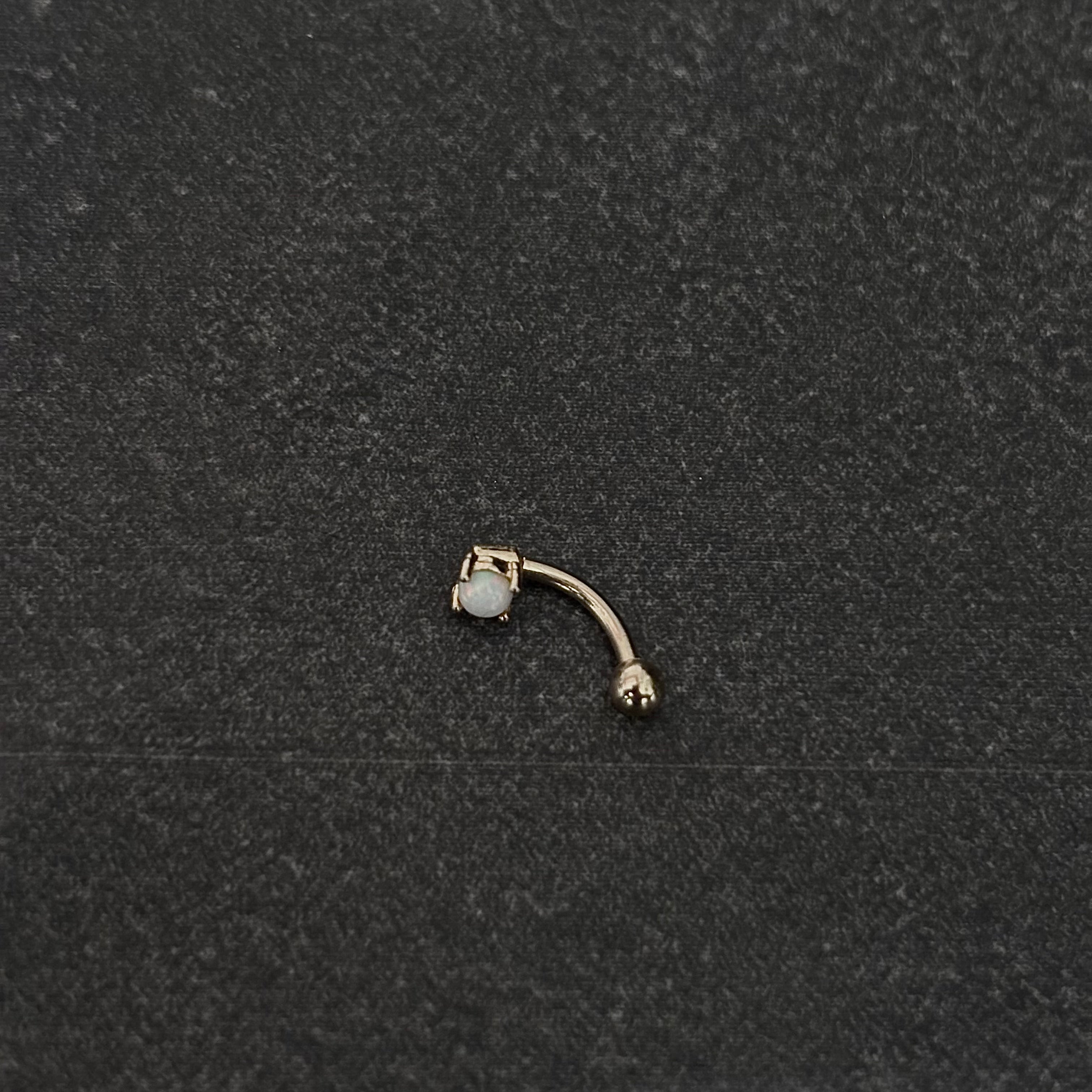Piercing ceja / rook c029