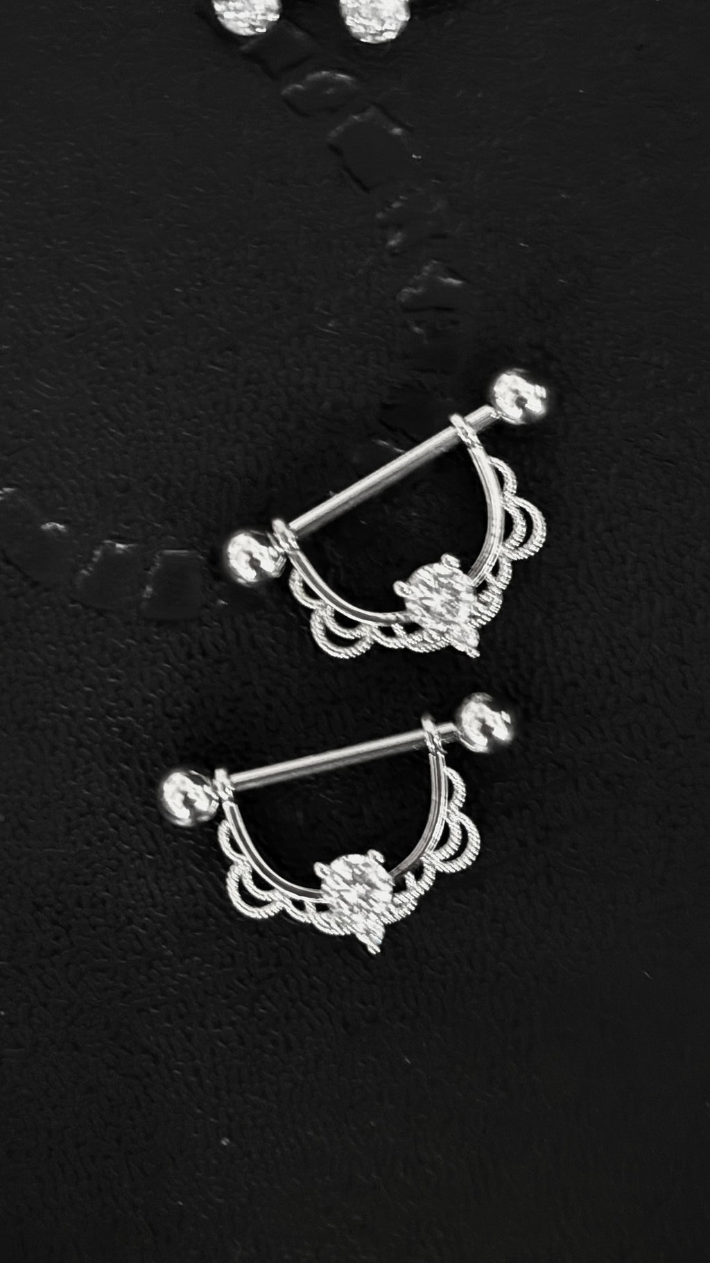Piercing pezón p028