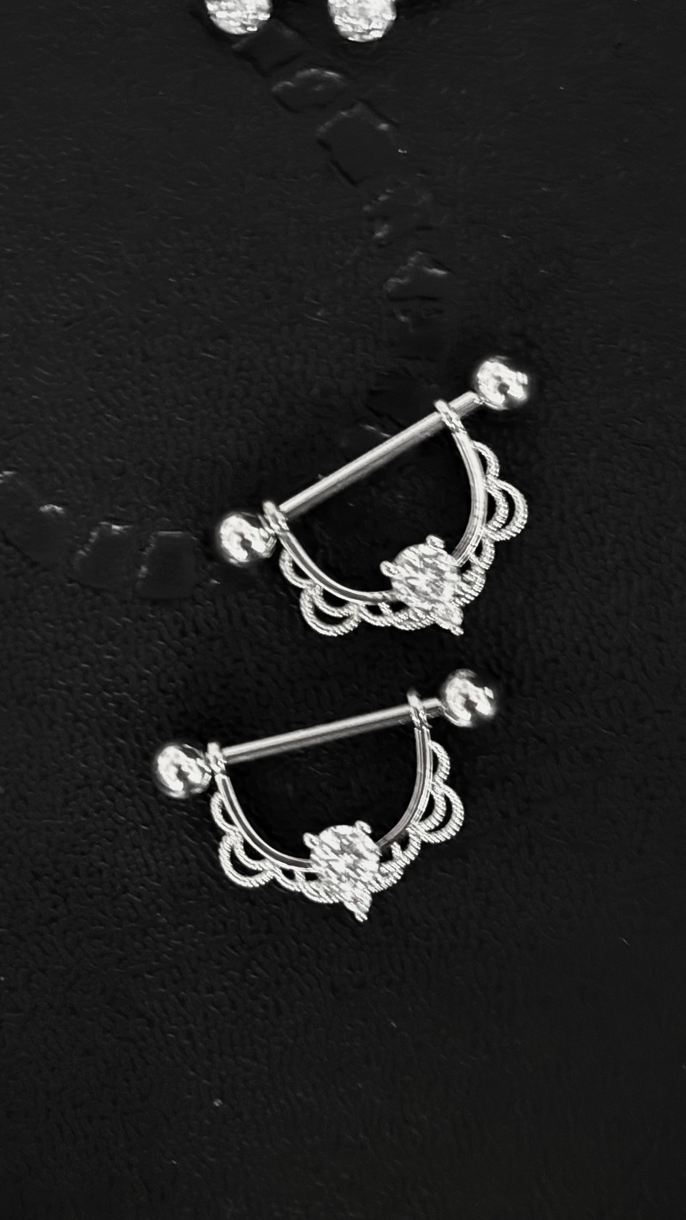 Piercing pezón p028